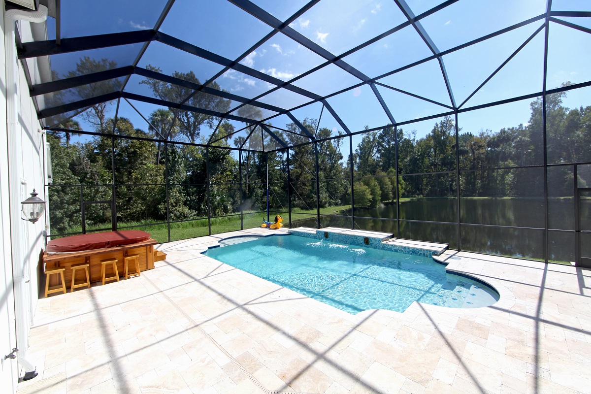 a swimming pool surrounded by trees